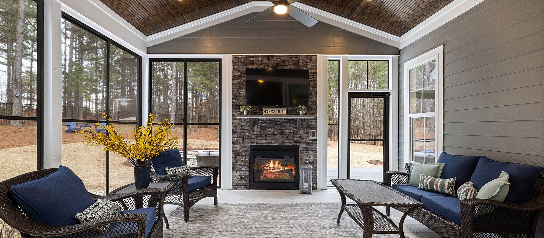 Screened porch with stone fireplace